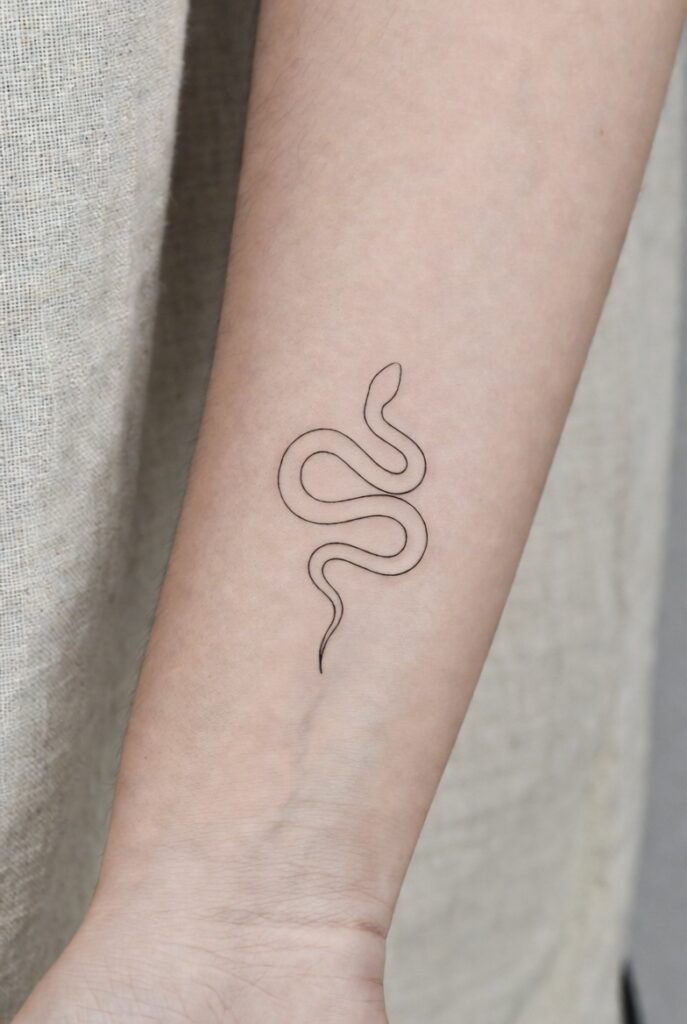 Bold and feminine snake tattoo ideas for women, featuring minimalist, floral, celestial, and symbolic snake tattoo designs with deep meaning.